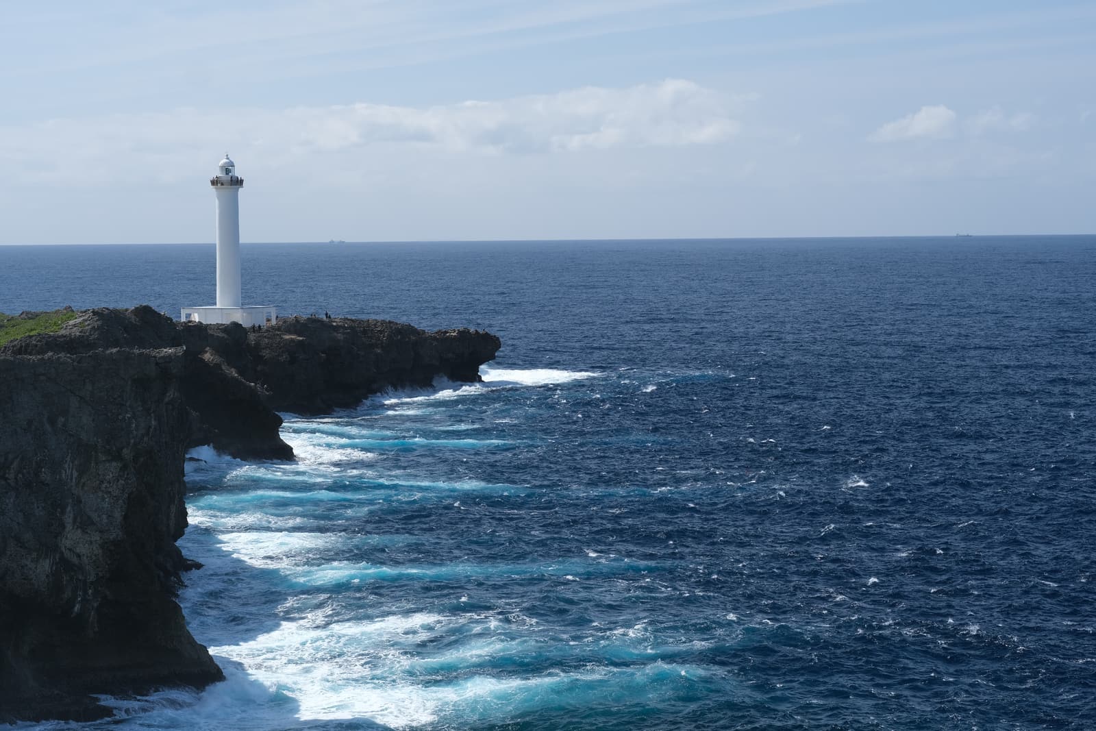 Cape Zanpa lighthouse above deep blue sea, Okinawa